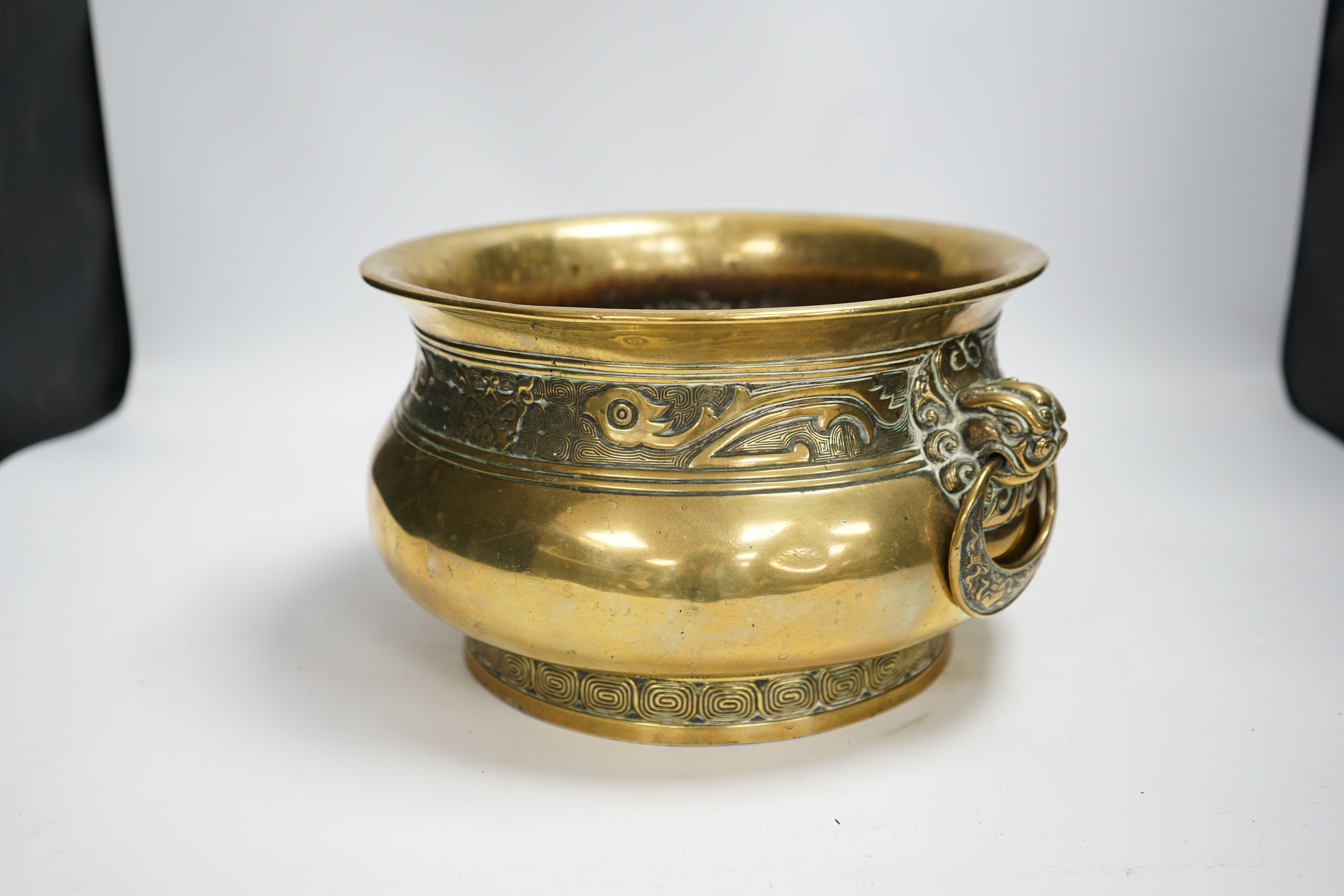A large Chinese bronze censer, Xuande mark to base, 31cm across
